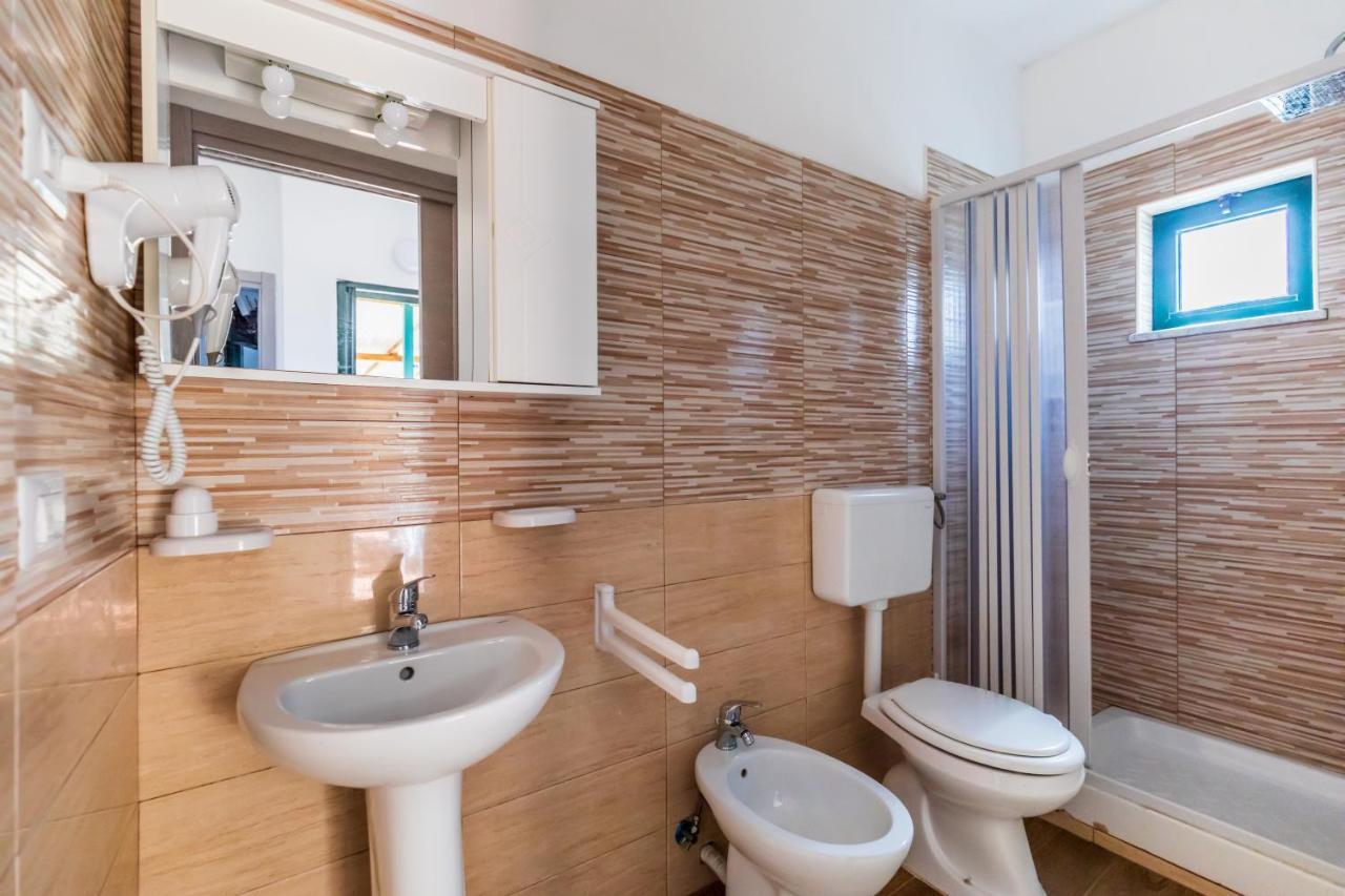 Villaggio Residence Pietra Grigia 卡梅罗塔的码头 外观 照片